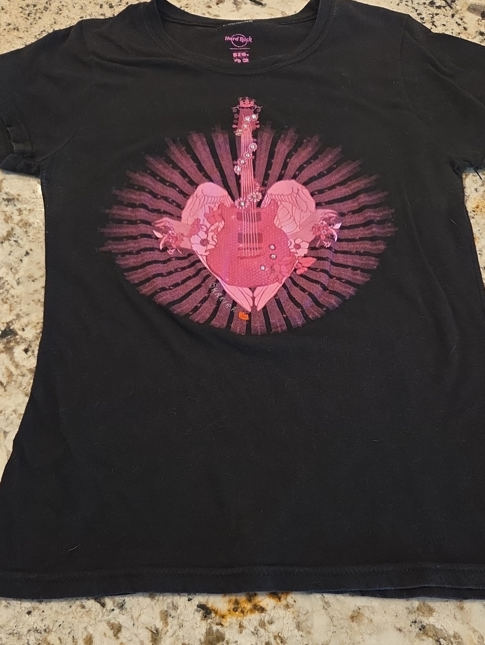 Hard Rock Cafe Womens Shakira Black Tee with Pink Guitar Heart Graphic
